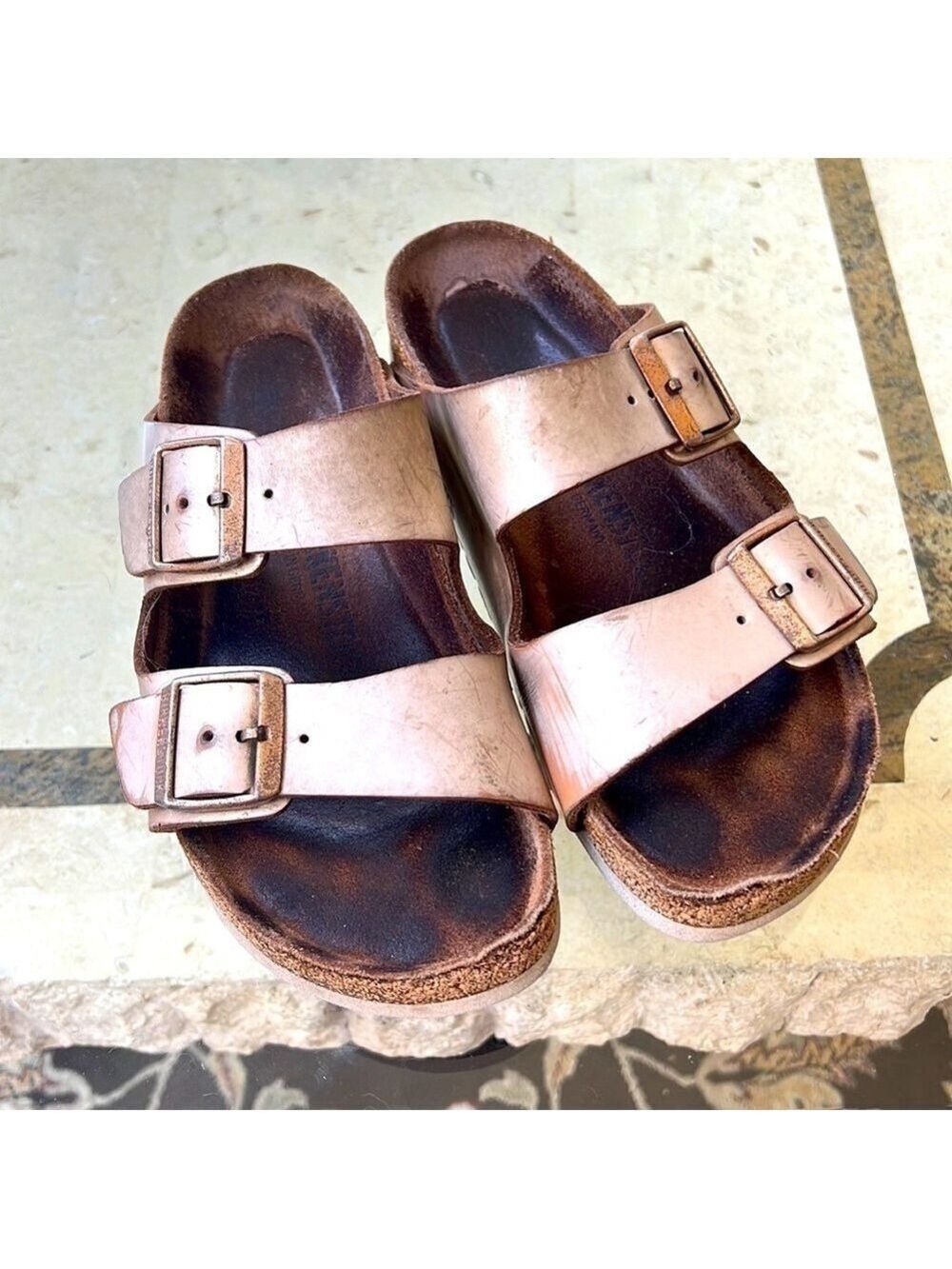 Birkenstock rose gold Arizona sandal. Used with some wear. Size 8/8.5